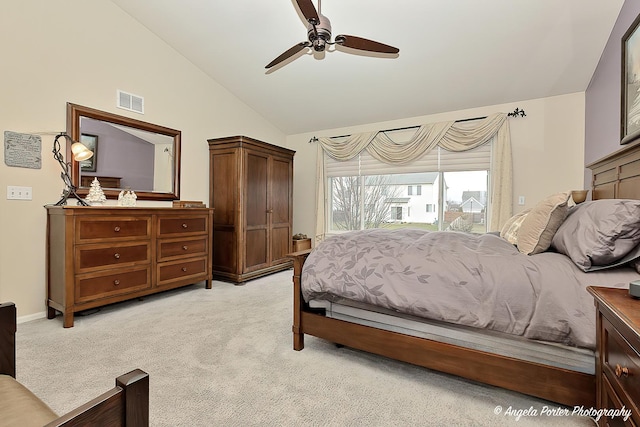 carpeted bedroom featuring high vaulted ceiling and ceiling fan