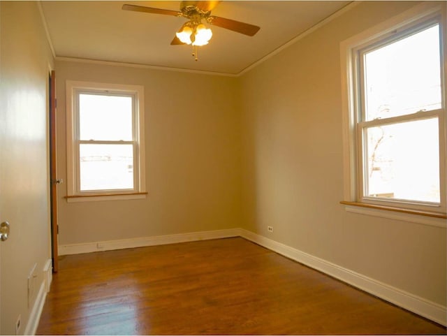 spare room with hardwood / wood-style floors, plenty of natural light, and ceiling fan