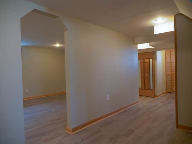 hallway featuring light wood-type flooring