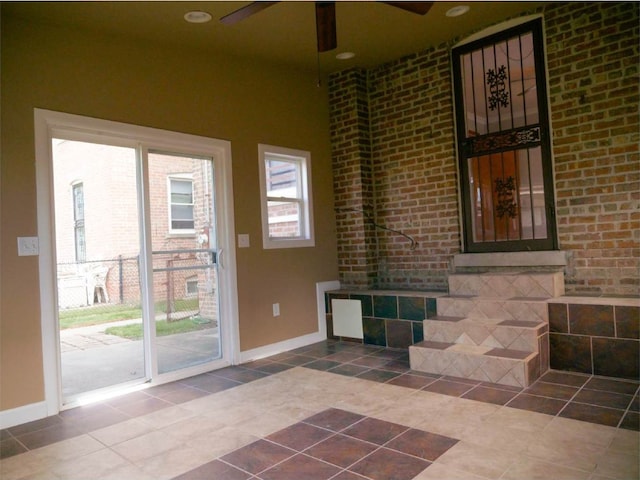 interior space featuring ceiling fan