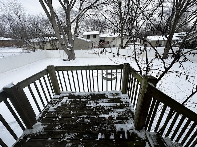 view of snow covered deck