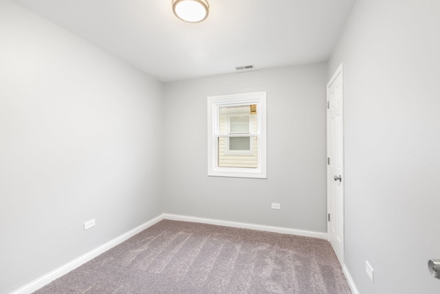 unfurnished room with carpet