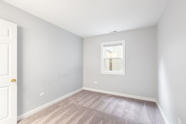 spare room with carpet flooring