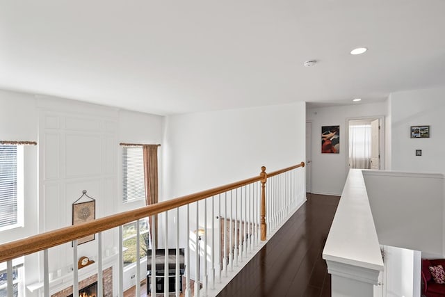 hall with dark hardwood / wood-style floors