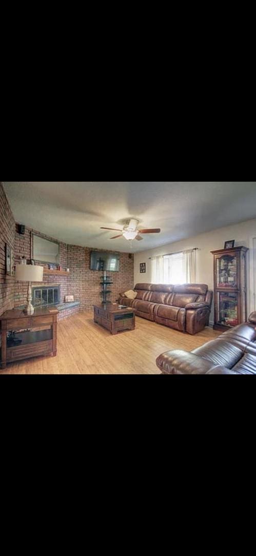 living room with brick wall