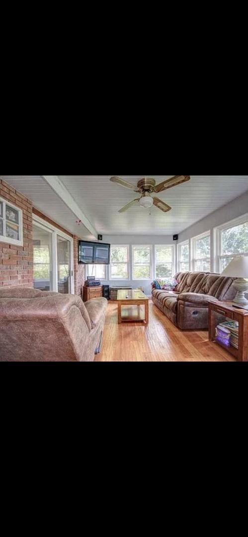 interior space featuring ceiling fan