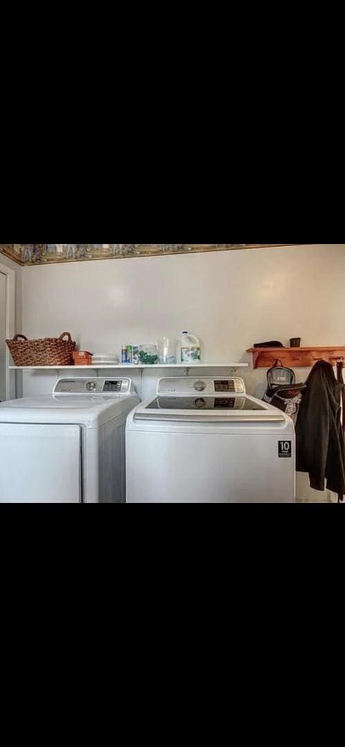 laundry area with washer and dryer