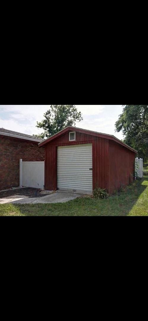 view of outdoor structure featuring a garage