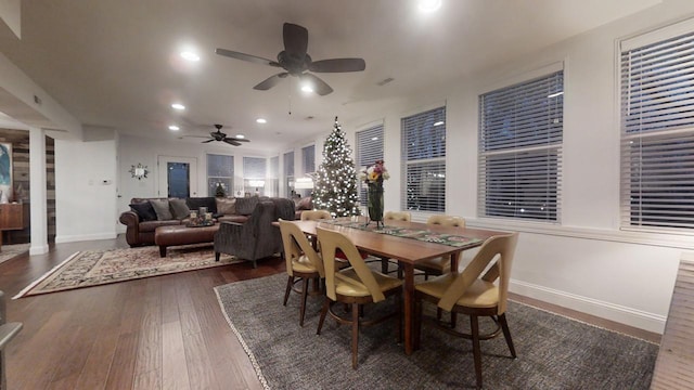 dining room with dark hardwood / wood-style floors and ceiling fan