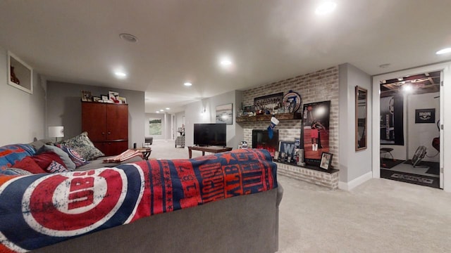 living room with carpet flooring and a brick fireplace