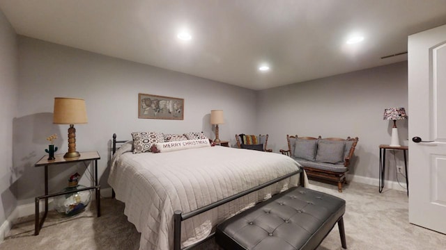 bedroom with light colored carpet