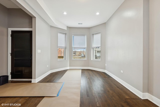 interior space with dark hardwood / wood-style floors