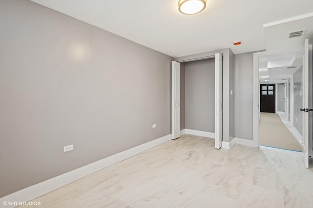 unfurnished bedroom featuring a closet