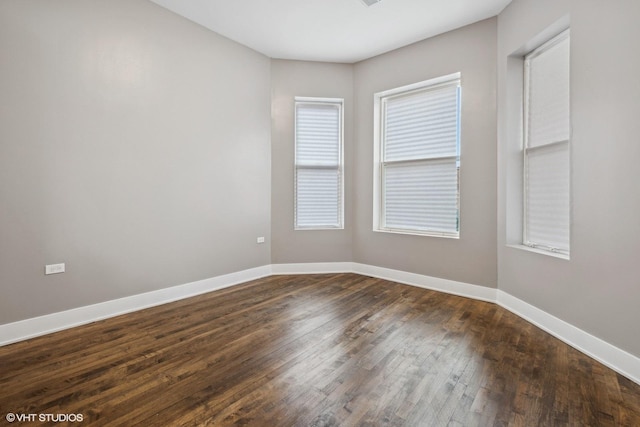 empty room featuring hardwood / wood-style flooring