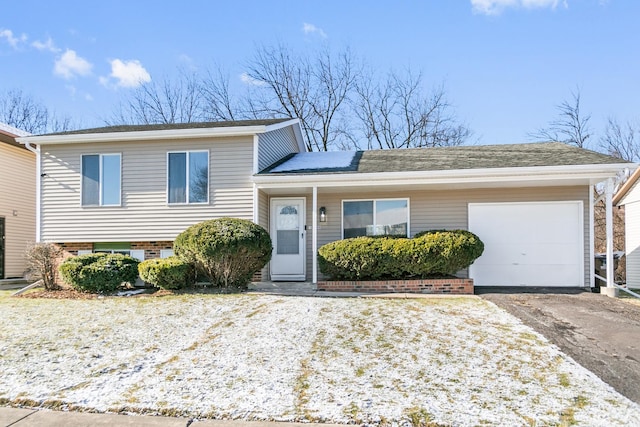 split level home with a garage