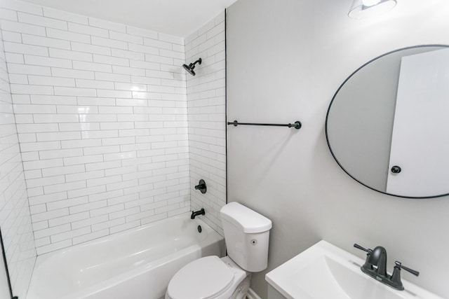 full bathroom with toilet, sink, and tiled shower / bath