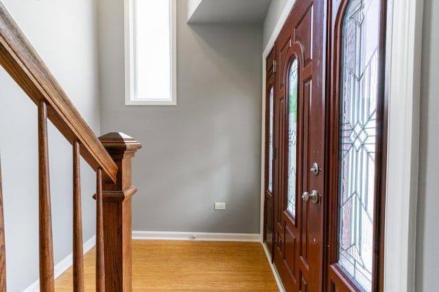 entryway with light hardwood / wood-style floors