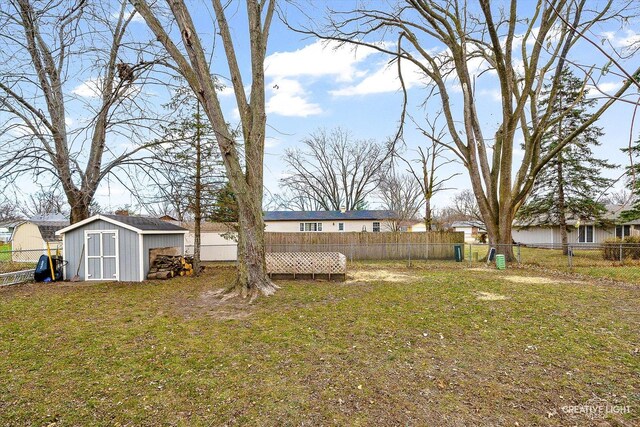 rear view of house with a patio area and an outdoor fire pit