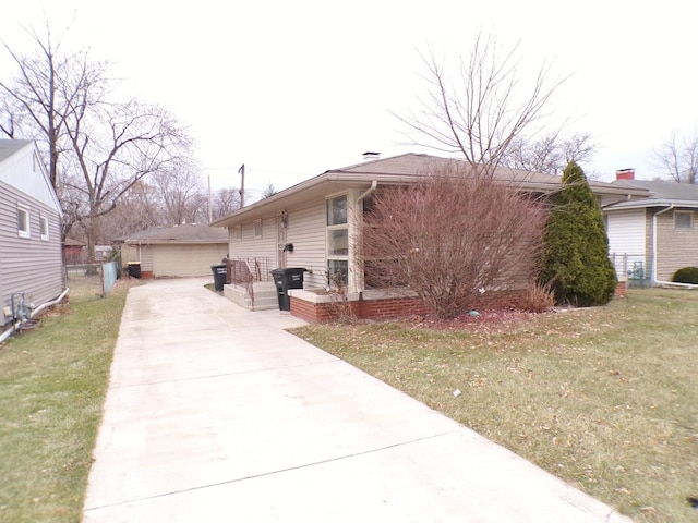 view of home's exterior featuring a lawn