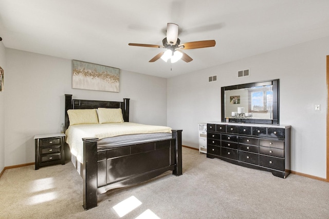 bedroom with light colored carpet and ceiling fan