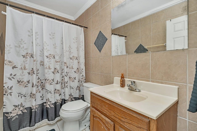 bathroom with vanity, ornamental molding, tile walls, and walk in shower