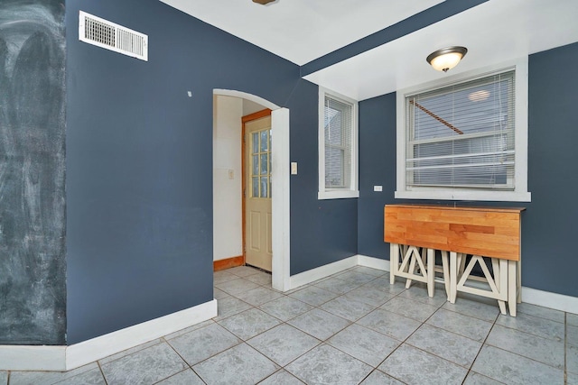 interior space featuring tile patterned flooring