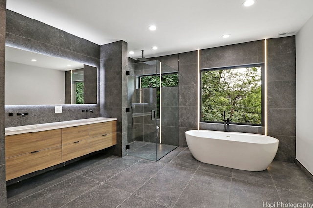 bathroom with tile walls