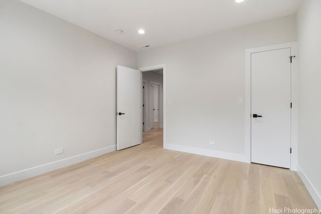 unfurnished bedroom with light hardwood / wood-style flooring