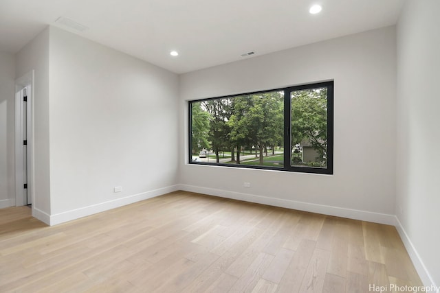 empty room with light wood-type flooring