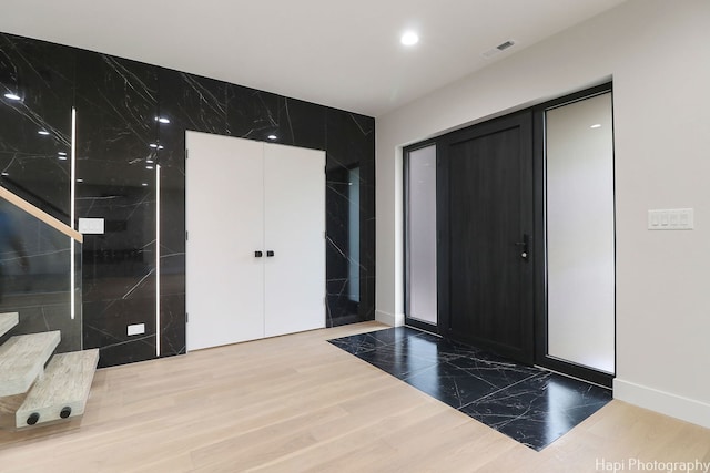 entryway featuring hardwood / wood-style floors