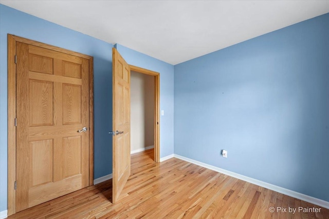 unfurnished bedroom with light hardwood / wood-style flooring