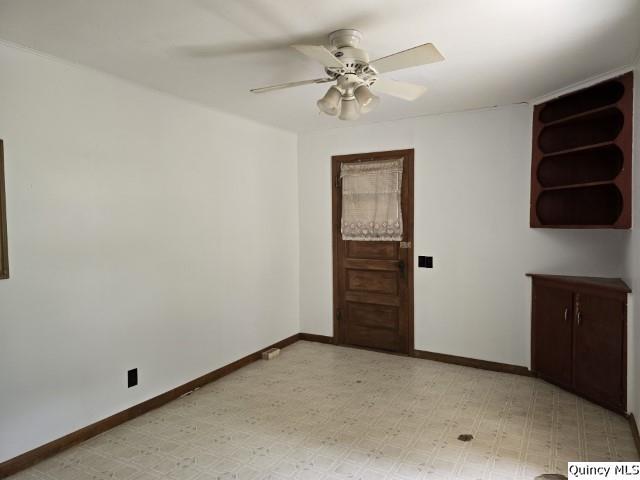 unfurnished room featuring ceiling fan