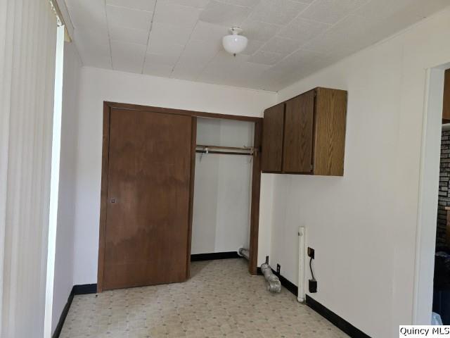 washroom with cabinets