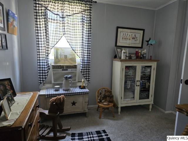 carpeted office space featuring cooling unit, crown molding, and french doors