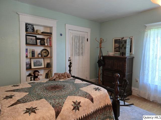 bedroom with parquet floors