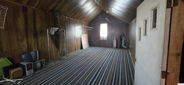 401 N 2nd St, La Harpe, IL 61450 - additional living space with wood walls, vaulted ceiling, carpet flooring, and wooden ceiling