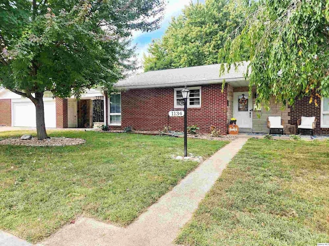 ranch-style house with a front lawn