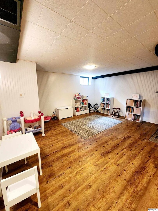 game room with wood-type flooring