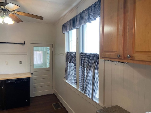 kitchen with dishwasher, ornamental molding, dark wood-type flooring, and ceiling fan