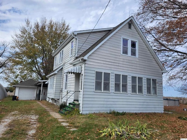 view of property exterior featuring a garage