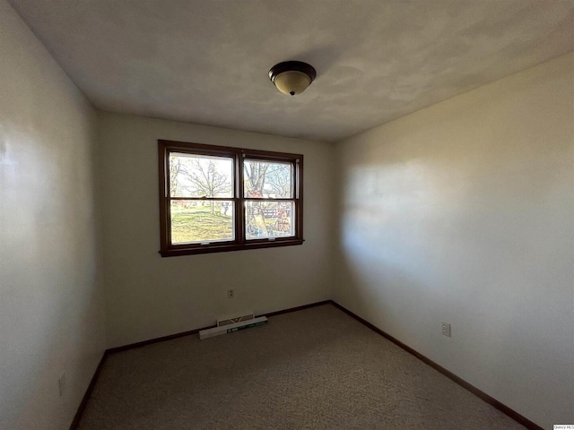 view of carpeted spare room