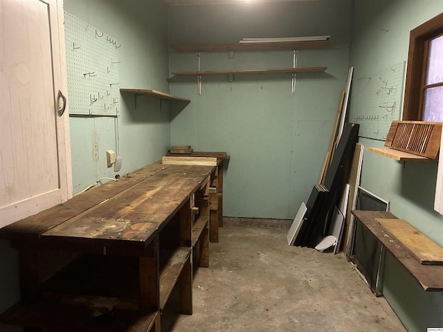 basement with a workshop area