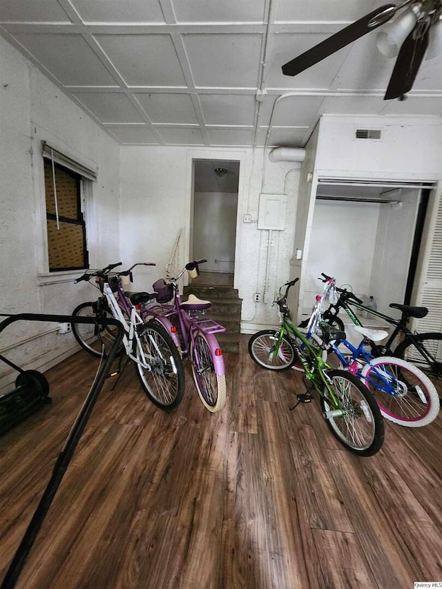 miscellaneous room featuring wood-type flooring and ceiling fan