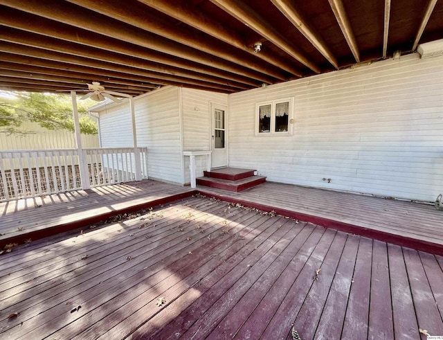 wooden deck with ceiling fan