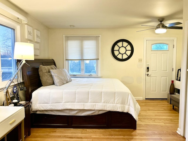 bedroom featuring light hardwood / wood-style flooring and ceiling fan