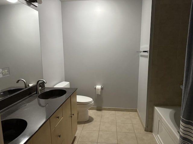 full bathroom with independent shower and bath, vanity, tile patterned floors, and toilet