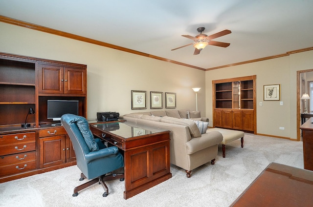 carpeted bedroom with ornamental molding and ceiling fan