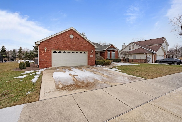 view of front facade featuring a garage and a front yard