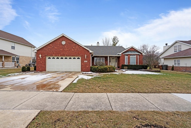 view of front of house featuring a garage and a front lawn