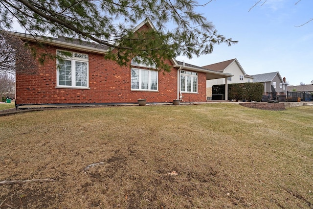 back of house with a yard